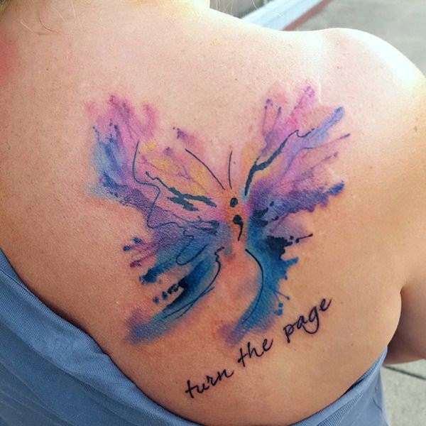 Tatuaje punto y coma mariposa