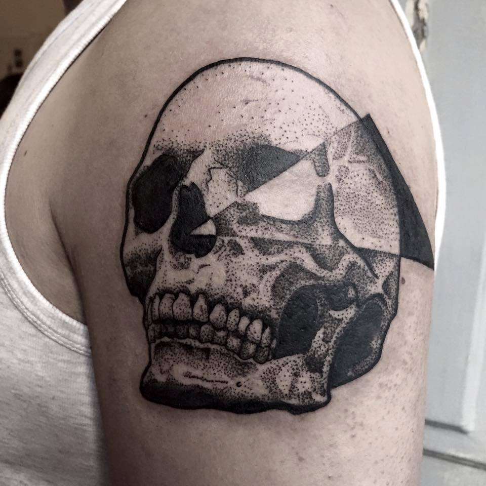 Tatuaje de calavera puntillismo