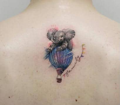 Tatuaje de elefante sobre un globo