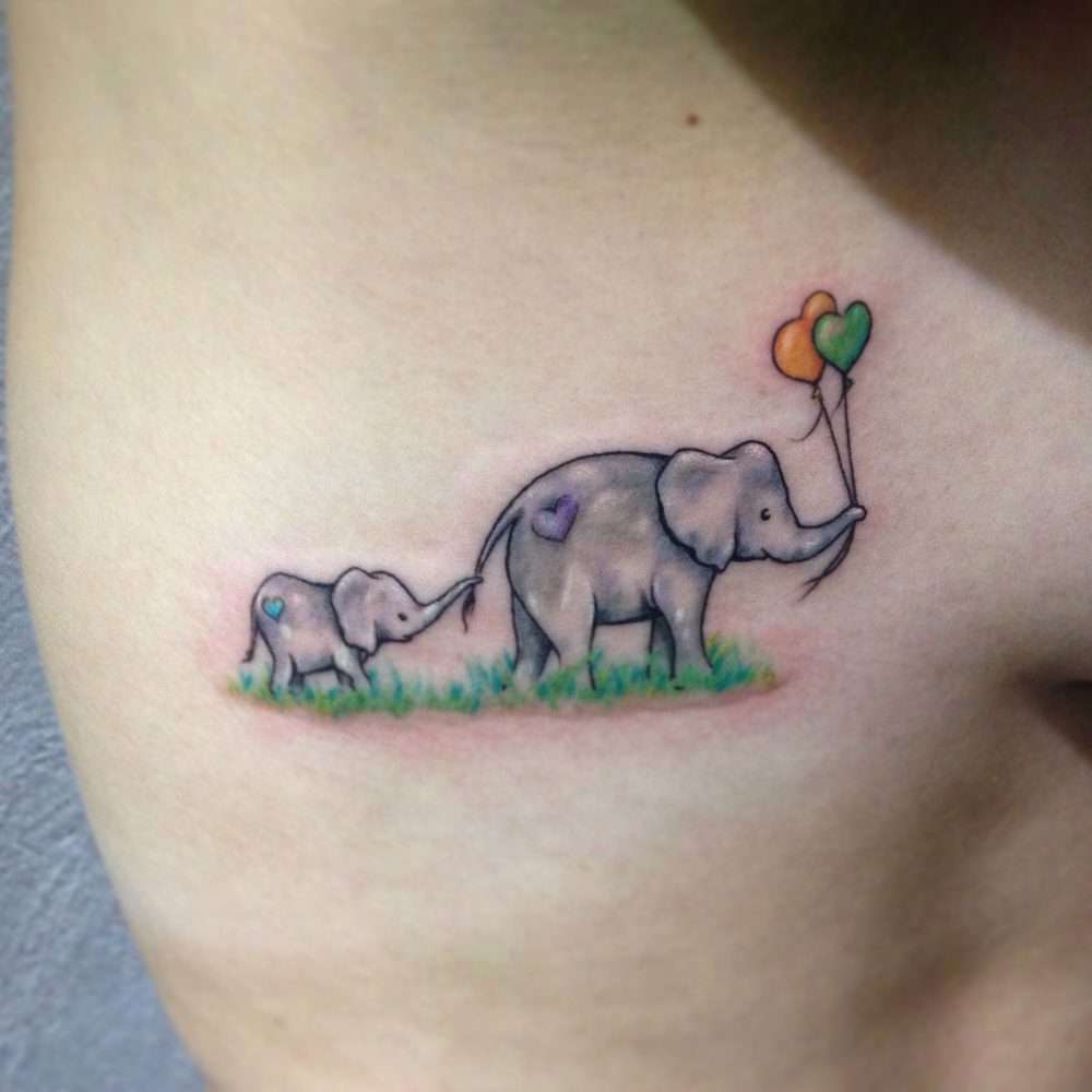 Tatuaje de elefantes en colores